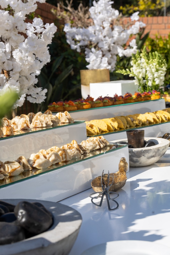Bespoke catering spread with artisan dishes at a premium Johannesburg event